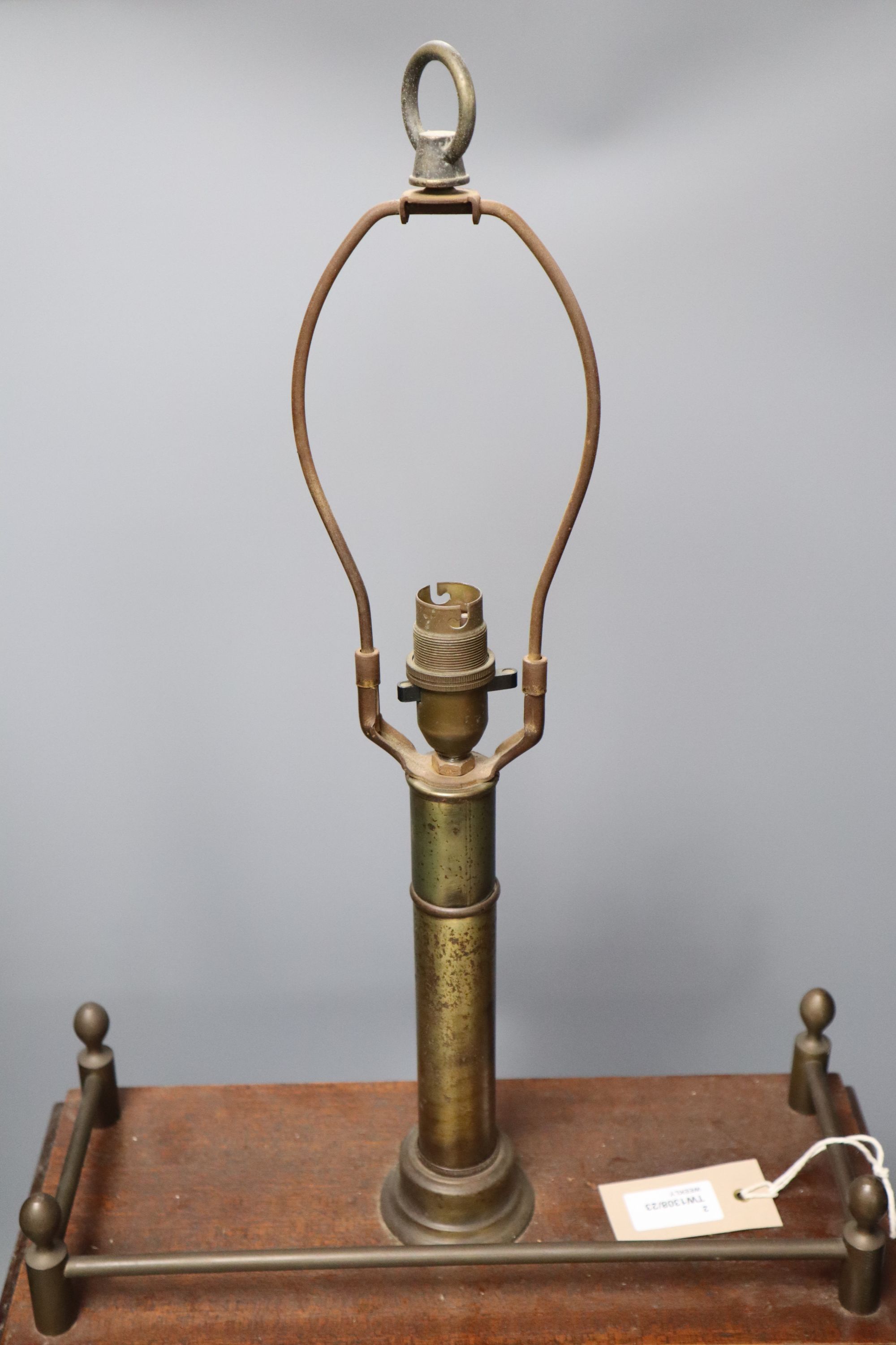 An Art Deco chromium desk calendar/barometer and a mahogany table lamp with thermometer and barometer dials